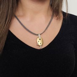 photo of worn Satin-finish Egg pendant in Yellow Gold and Diamonds