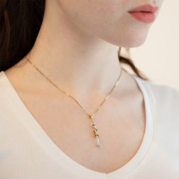 Photo of worn Rose, Yellow and White Gold "Pinocchio" charm