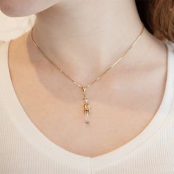 Photo of worn Rose, Yellow and White Gold "Pinocchio" charm