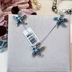 Orecchini Stella Marina con Diamanti Blu in Oro Bianco