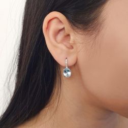 Photo of worn Aquamarine 10mm x 8mm and Diamond Earrings