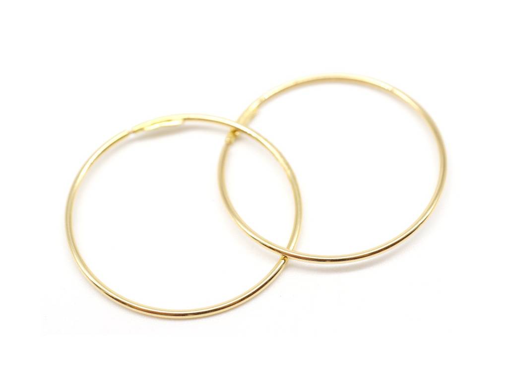 Circle hoop earrings 18kt yellow gold