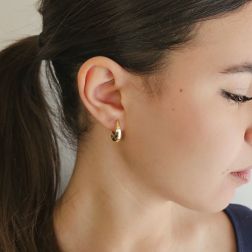 Photo of worn Yellow Gold Drop-Shaped Hoops