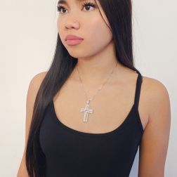 Photo of worn Diamond Shine Cross Charm