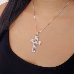 Photo of worn Diamond Shine Cross Charm