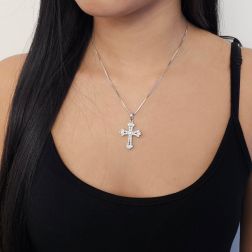 photo of worn Gothic cross pendant with two rows of Diamonds