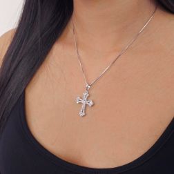 photo of worn Gothic cross pendant with two rows of Diamonds