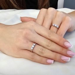 Photo of worn Cross-Vault Trilogy Ring in White Gold with GIA Diamonds