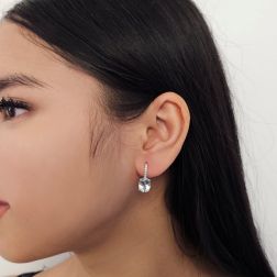 Photo of worn Aquamarine 10mm x 8mm and Diamond Earrings