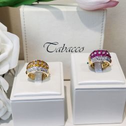 Banded design ring with 14 Pink Sapphires and 50 Diamonds