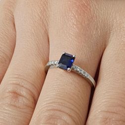 Octagonal Blue Sapphire Solitaire Ring with 8 Diamonds in White Gold photo worn