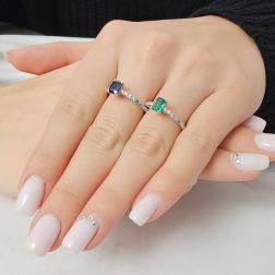 Octagonal Blue Sapphire Solitaire Ring with 8 Diamonds in White Gold photo worn