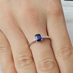 Octagonal Blue Sapphire Solitaire Ring with 8 Diamonds in White Gold photo worn