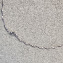 Wavy Semirigid flexible faceted necklace in white gold