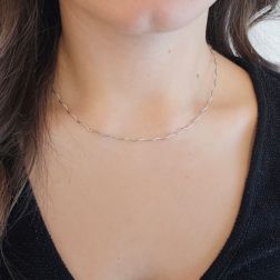 Photo of worn Wavy Semirigid flexible faceted necklace in white gold