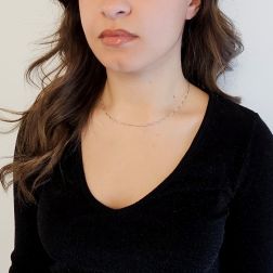 Photo of worn Wavy Semirigid flexible faceted necklace in white gold