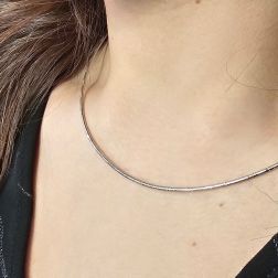 Photo of worn 1.50mm Tubular Semirigid flexible faceted necklace in white gold