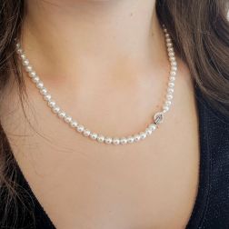 Photo of worn Fresh Water 5mm Pearl Necklace with White Gold and Diamond Drop Clasp