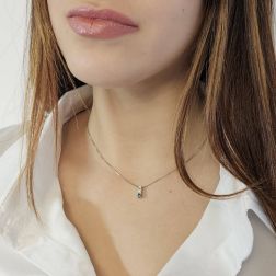 photo of worn Trilogy scalar necklace with Blue Diamond