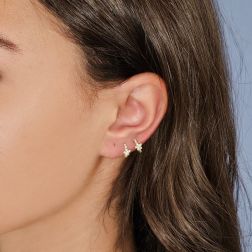 Photo of worn Star Earrings Mini Round Hoops with Diamonds on Yellow Gold