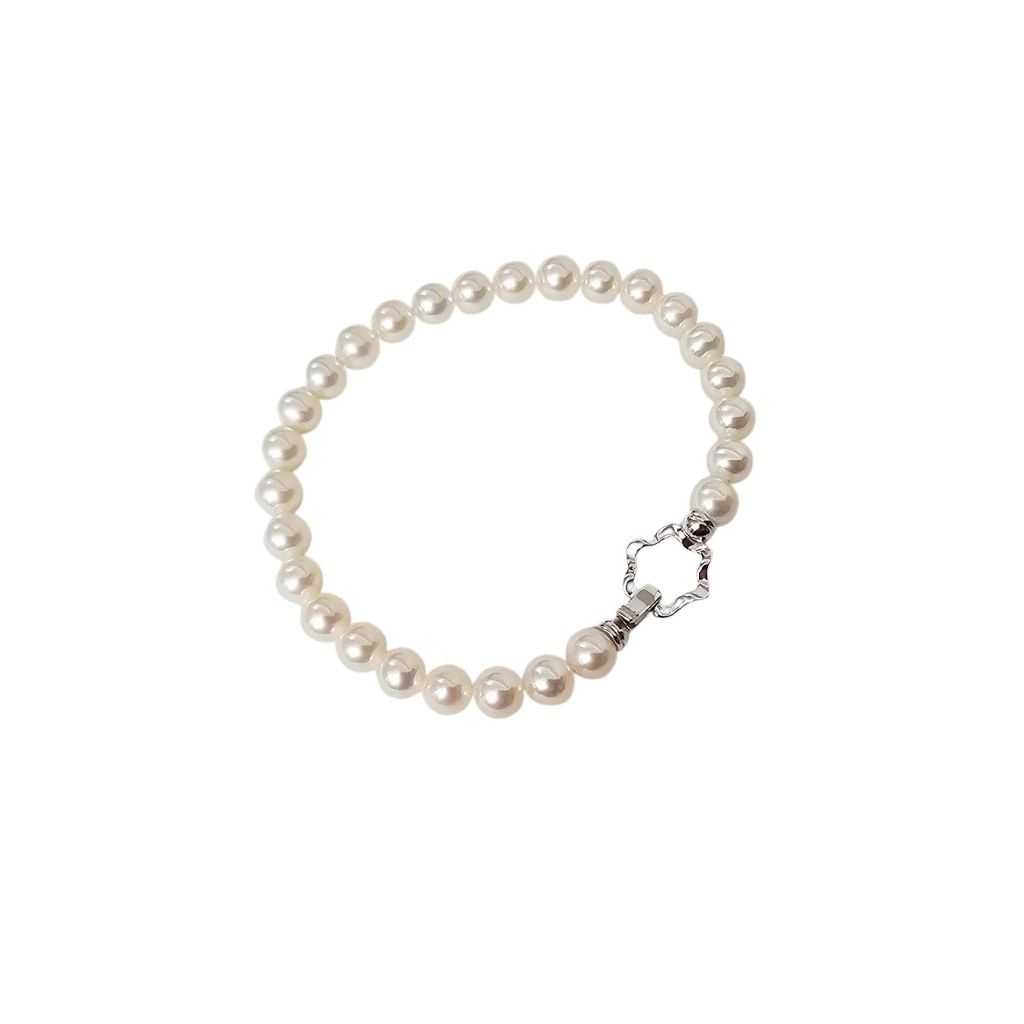 6-6.50mm Fresh Water pearls Bracelet with 18kt White Gold Flower clasp