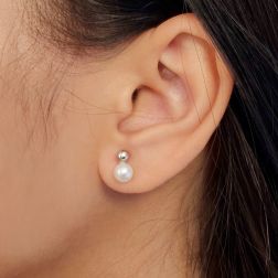 Photo of worn 4mm Sphere Earrings in White Gold and 5.5mm Fresh Water Pearl