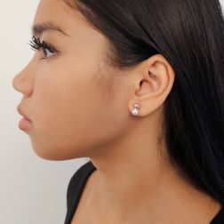 Photo of worn 5mm Sphere Earrings in White Gold and 5.5mm Fresh Water Pearl