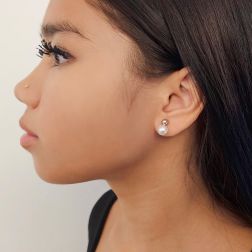 Photo of worn 5mm Sphere Earrings in White Gold and 7.5mm Fresh Water Pearl