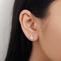 Photo of worn  5.5mm Akoya Pearl and 0.05ct Diamond Earrings