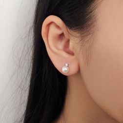 Photo of worn 6.5mm Akoya Pearls and 0.07ct Diamonds Earrings