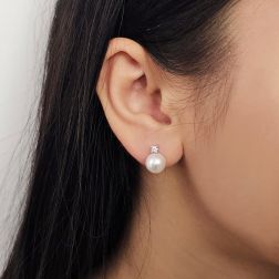 Photo of worn 8.5mm Akoya Pearl and 0.11ct Diamond Earrings