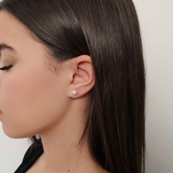 photo of worn Earrings with 6.5mm freshwater pearls in white gold