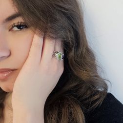 Photo of worn Open Design Ring with 9mm Peridot and 7mm Amethyst surrounded by Diamonds