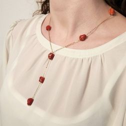 photo of worn Y Necklace in Yellow Gold and Red Coral