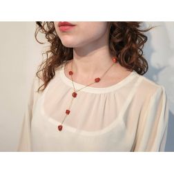 photo of worn Y Necklace in Yellow Gold and Red Coral