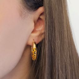 Photo of worn yellow gold Hoop Earrings with enamel and animal motif 2.80cm x 5.20mm