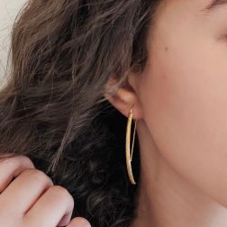 Photo of worn Knurled half-moon earrings