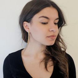 Photo of worn Curved Sculptural Knurled Drop Earrings