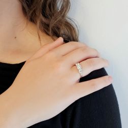 Photo of worn Ring Trilogy 0.57ct/0.60ct center and 0.38ct side