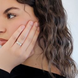 Photo of worn Ring Trilogy 0.57ct/0.60ct center and 0.38ct side
