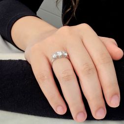 Photo of worn Ring Trilogy 0.57ct/0.60ct center and 0.38ct side