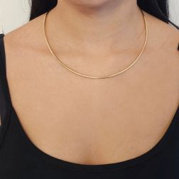 Photo of worn ‘Halo’ rigid necklace in yellow gold