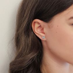 Photo of worn Solitary Studs earrings with round 5.80mm acquamarines in 18kt white gold