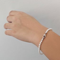 Photo of worn Freshwater Pearl Bracelet with a Heart-Shaped Clasp in White Gold and Diamonds