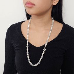Photo of worn 69cm long necklace with white pearls and cat's eye