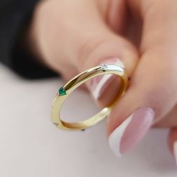 Photo of worn Thin Pyramid Band with Diamonds, Blue Sapphire, Ruby, Emerald on Yellow Gold