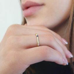 Photo of worn Thin Pyramid Band with Diamonds, Blue Sapphire, Ruby, Emerald on Yellow Gold