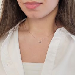 Photo of worn Faceted Circle Light Point Necklace 0.020ct - 3.70mm