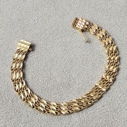 Bracciale a segmenti Foglioline Diamantate e Filo Torto in Oro Giallo