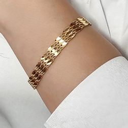 Bracciale a segmenti Foglioline Diamantate e Filo Torto in Oro Giallo foto indossata